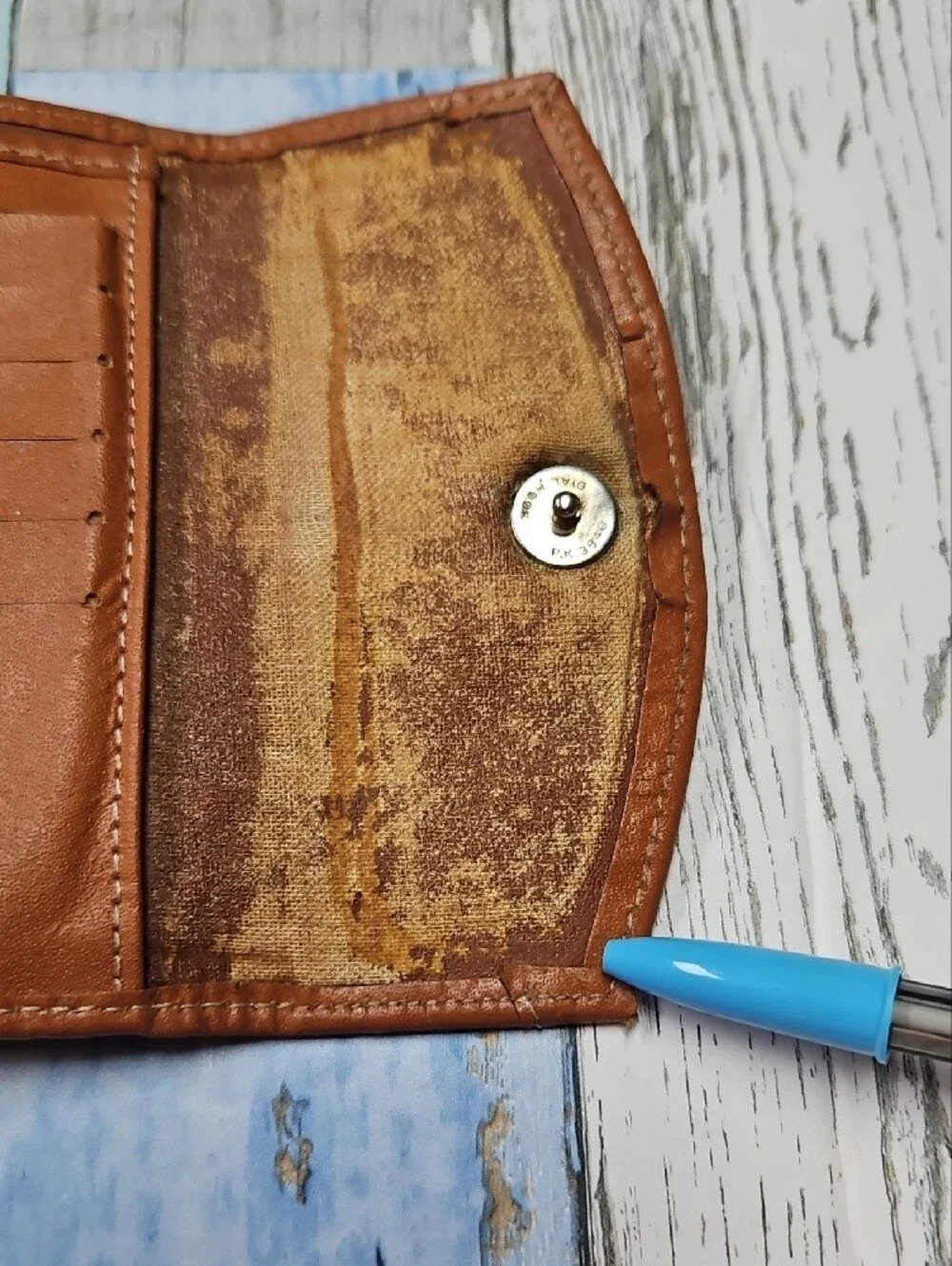 Vintage Dooney & Bourke All-Weather Leather compact wallet in hunter green/tan